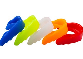 an assortment of colored mouthguards 