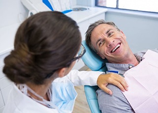 a patient chatting with their dentist