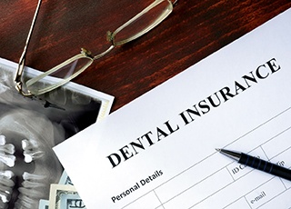 a closeup of a dental insurance form