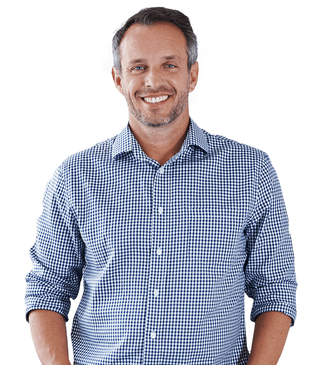 Man smiling in blue and white shirt after restorative dentistry