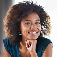 Woman smiling after cosmetic dentistry