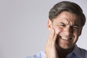 photo of a man with jaw pain