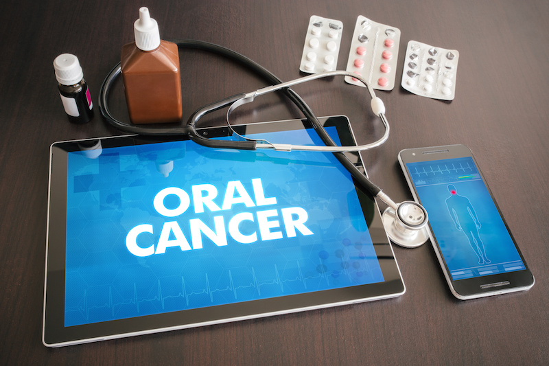oral cancer written on medical tablet 